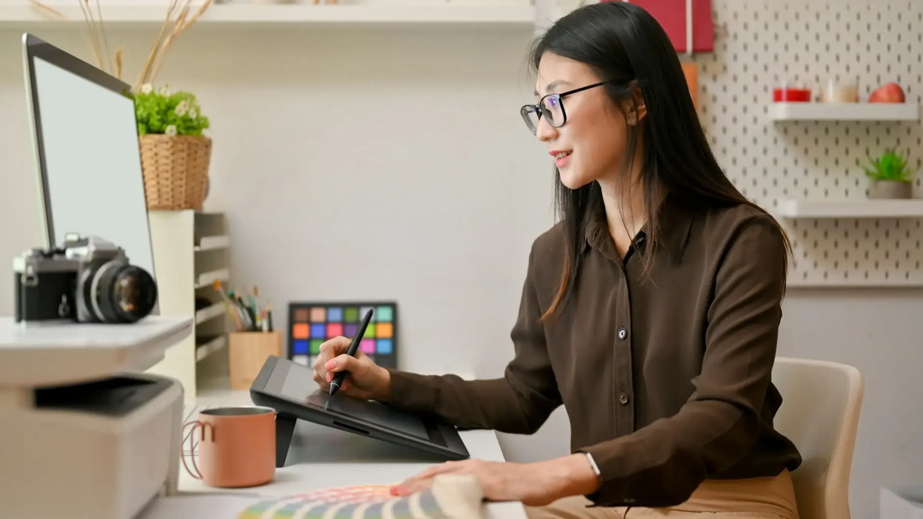 Writer creating undetectable AI with WriteHuman on laptop.